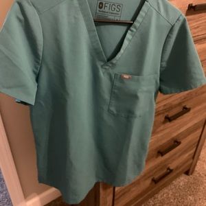 Figs one pocket scrub top. Seafoam green